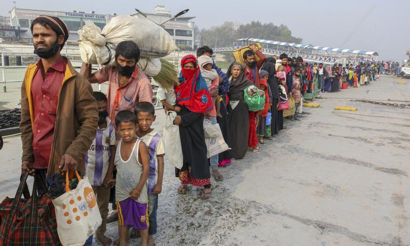In this Feburary 15, 2021 file photo, Rohingya refugees headed to the Bhasan Char island are prepared to board navy vessels from the southeastern port city of Chattogram, Bangladesh. — AP/File
