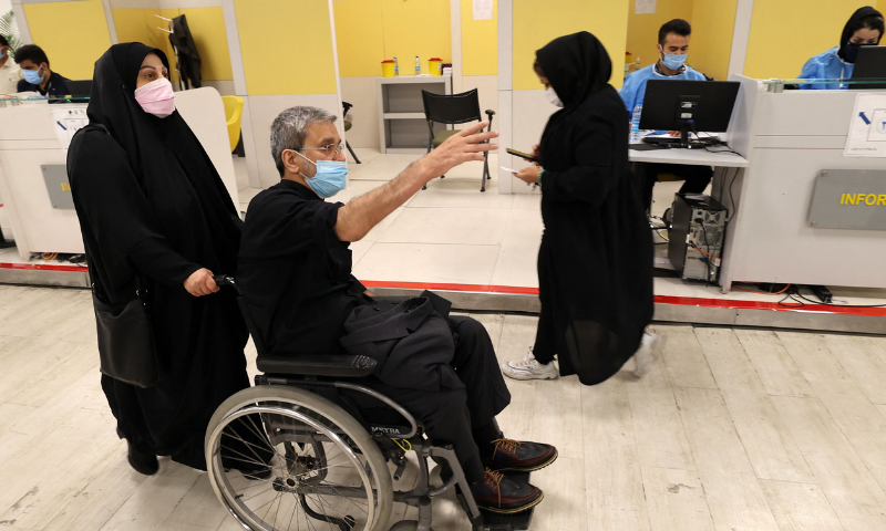 People arrive at a vaccination centre set up inside the Iran Mall in the capital Tehran, to be inoculated against the coronavirus, on Saturday. — AFP