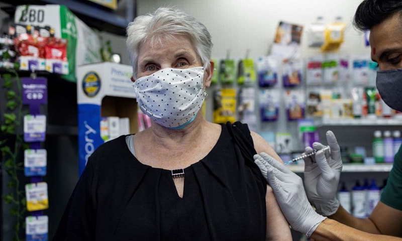 In this file photo, a woman receives the Pfizer-BioNTech vaccine as a booster dose at Skippack Pharmacy in Schwenksville, Pennsylvania, US. — Reuters/File