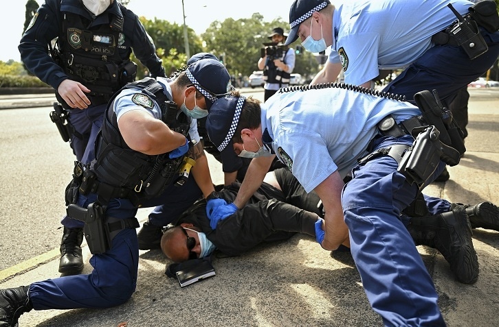 Police arrest a man during an anti-lockdown protest in Sydney, Australia on Aug 21, 2021 (Saturday). — AP