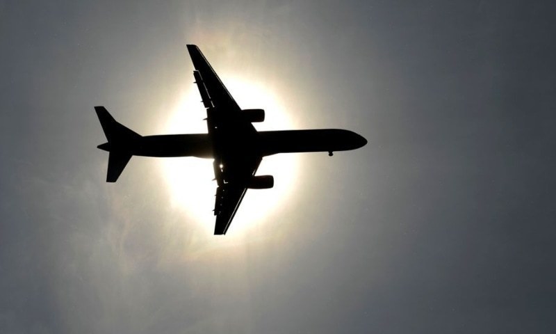 This file photo shows the silhouette of a plane in the sky. — AFP/File