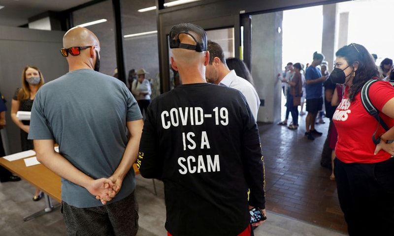 In this file photo, people protest against the school mask mandate, enacted to help slow the spread of COVID-19, outside a Hillsborough County School Board meeting in Tampa, Florida. &mdash; Reuters/File