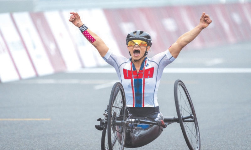 TOKYO: Oksana Masters of the US celebrates after winning the Tokyo Paralympics women&rsquo;s H5 road race at the Fuji International Speedway on Wednesday.&mdash;AP