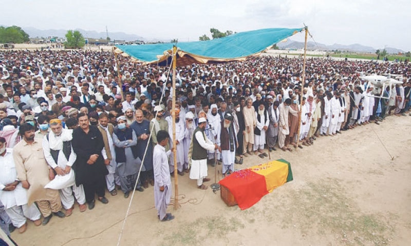 WORKERS of various political parties, tribal elders and lawmakers attend the funeral of Baloch nationalist leader Sardar Ataullah Mengal at a school ground in the Wadh town of Khuzdar on Friday.