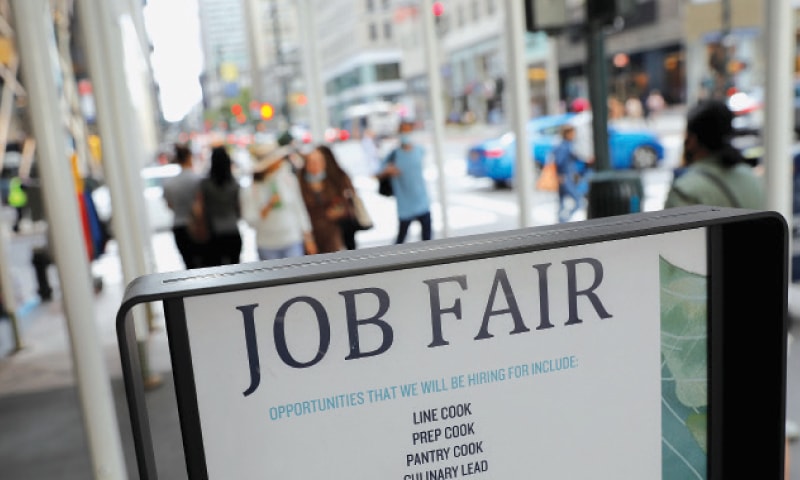 Signage for a job fair is seen on 5th Avenue after the release of the jobs report in Manhattan, New York City, USA, last week.—Reuters Signage for a job fair is seen on 5th Avenue after the release of the jobs report in Manhattan, New York City, USA, last week.—Reuters