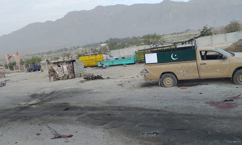 A damaged vehicle of security forces is seen at the site of the attack on the Frontier Corps (FC) checkpost on Quetta's Mastung Road on Sunday. — DawnNewsTV