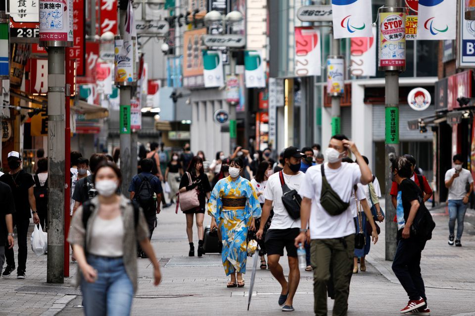People walk in Shibuya shopping area in Tokyo, Japan on August 29. — Reuters