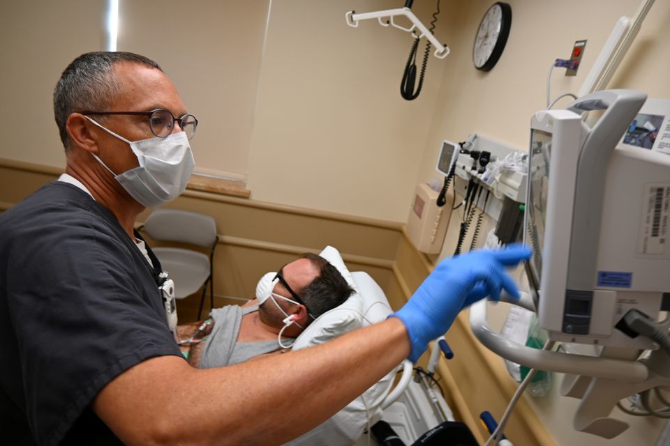 Nurse Chris Prott examines a patient in the urgent care department at the Iron Mountain VA Medical Centre in Iron Mountain, Michigan, US on August 25. &mdash; Reuters
