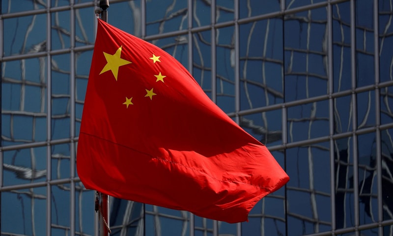 In this file photo, the Chinese national flag is seen in Beijing, China. — Reuters/File