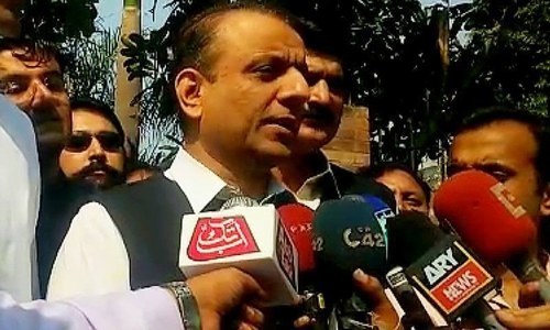 Senior Minister Aleem Khan talks to the media in this file photo. — DawnNewsTV