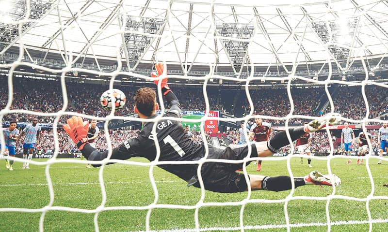 LONDON: Manchester United goalkeeper David de Gea saves a penalty from West Ham United&rsquo;s Mark Noble during their Premier League match at the London Stadium on Sunday. &mdash; Reuters
