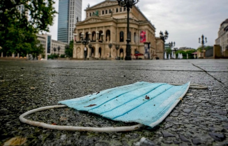 A face mask sits discarded in Frankfurt, Germany, in this July 13 file photo. — AP
