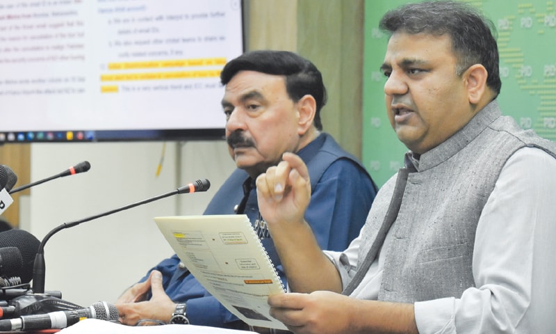 ISLAMABAD: Information Minister Fawad Chaudhry along with Interior Minister Sheikh Rashid Ahmed addresses a
press conference on Wednesday.—White Star ISLAMABAD: Information Minister Fawad Chaudhry along with Interior Minister Sheikh Rashid Ahmed addresses a
press conference on Wednesday.—White Star