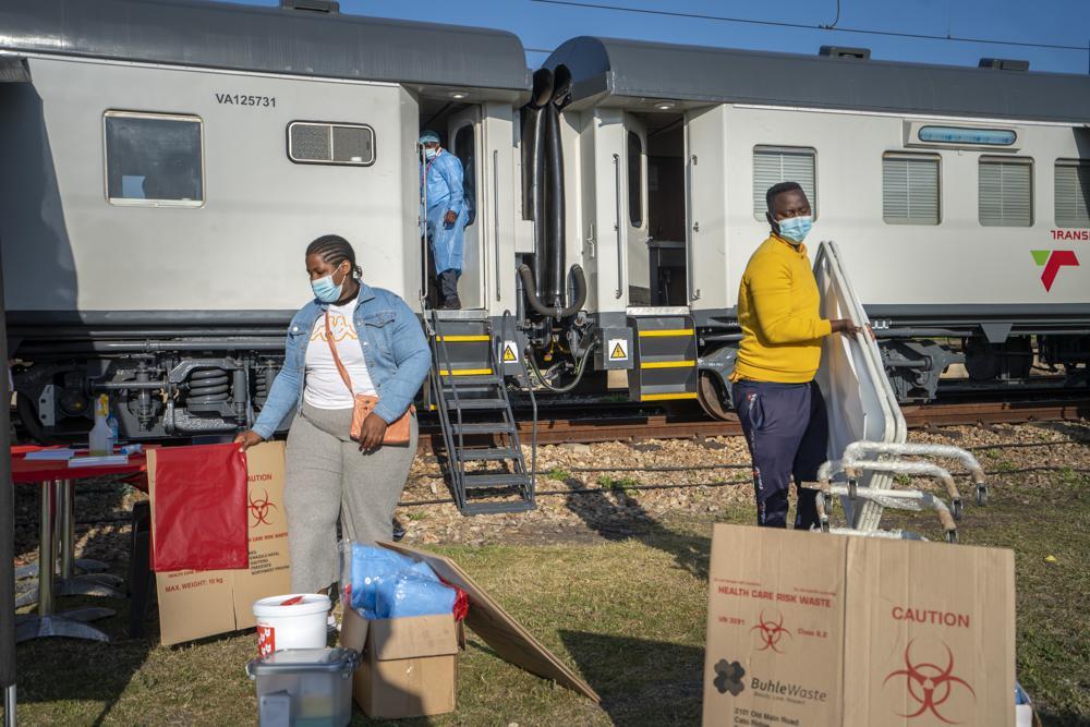 Medical personnel prepare the Covid-19 vaccination train parked at the Swartkops railroad yard outside Gqeberha, South Africa, for the arrival of patients on Sept 23. — AP