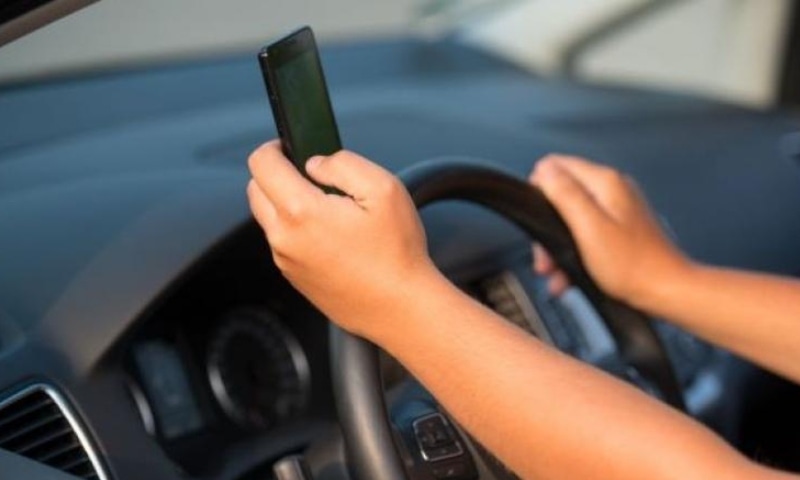 Since the start of 2021, 15,233 drivers have been fined a meagre Rs300 for using mobile phones while driving. — AFP