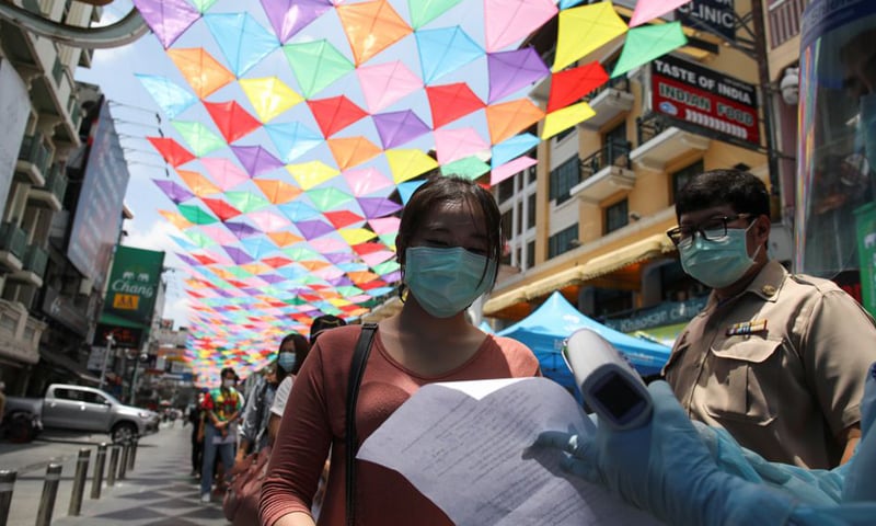 In this file photo, local residents queue for a Covid-19 nasal swab test in Bangkok, Thailand. — Reuters