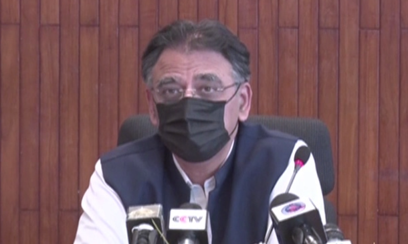 Planning and Development Minister Asad Umar addresses a press conference in Islamabad. — DawnNewsTV