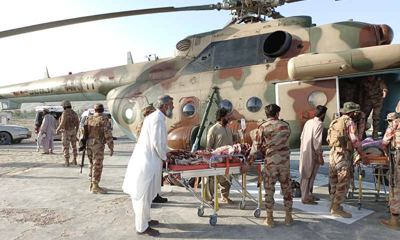 An injured patient is being airlifted from Harnai to Quetta. — Photo via NDMA