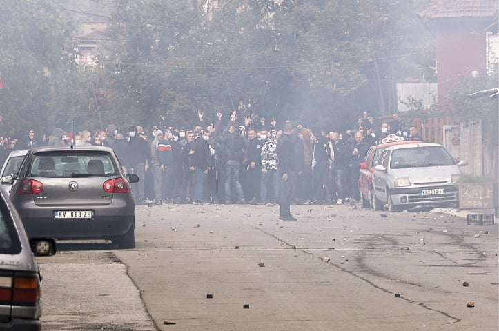 Ethnic Serbs block a street in the Serb-dominated part of Mitrovica, an ethnically divided town in Kosovo, on Wednesday.—AP