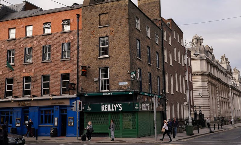 In this file photo, a shuttered pub called Reilly's is seen closed due to Covid restrictions in Dublin, Ireland. &mdash; Reuters/File