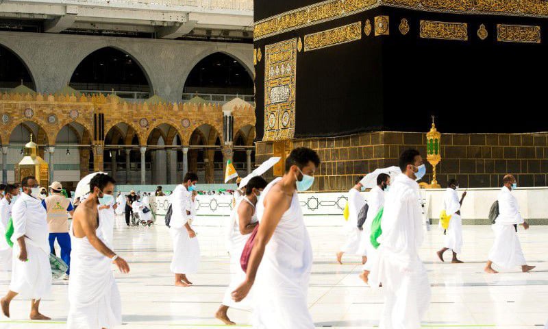 In this file photo, pilgrims wearing face masks and keeping social distance perform tawaf around Kaabah during the annual Haj pilgrimage. &mdash; Reuters/File