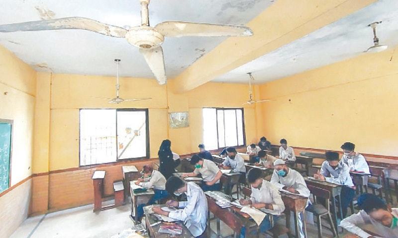 In this file photo, students attempt matric papers at an examination centre in Nazimabad. — Fahim Siddiqi/White Star