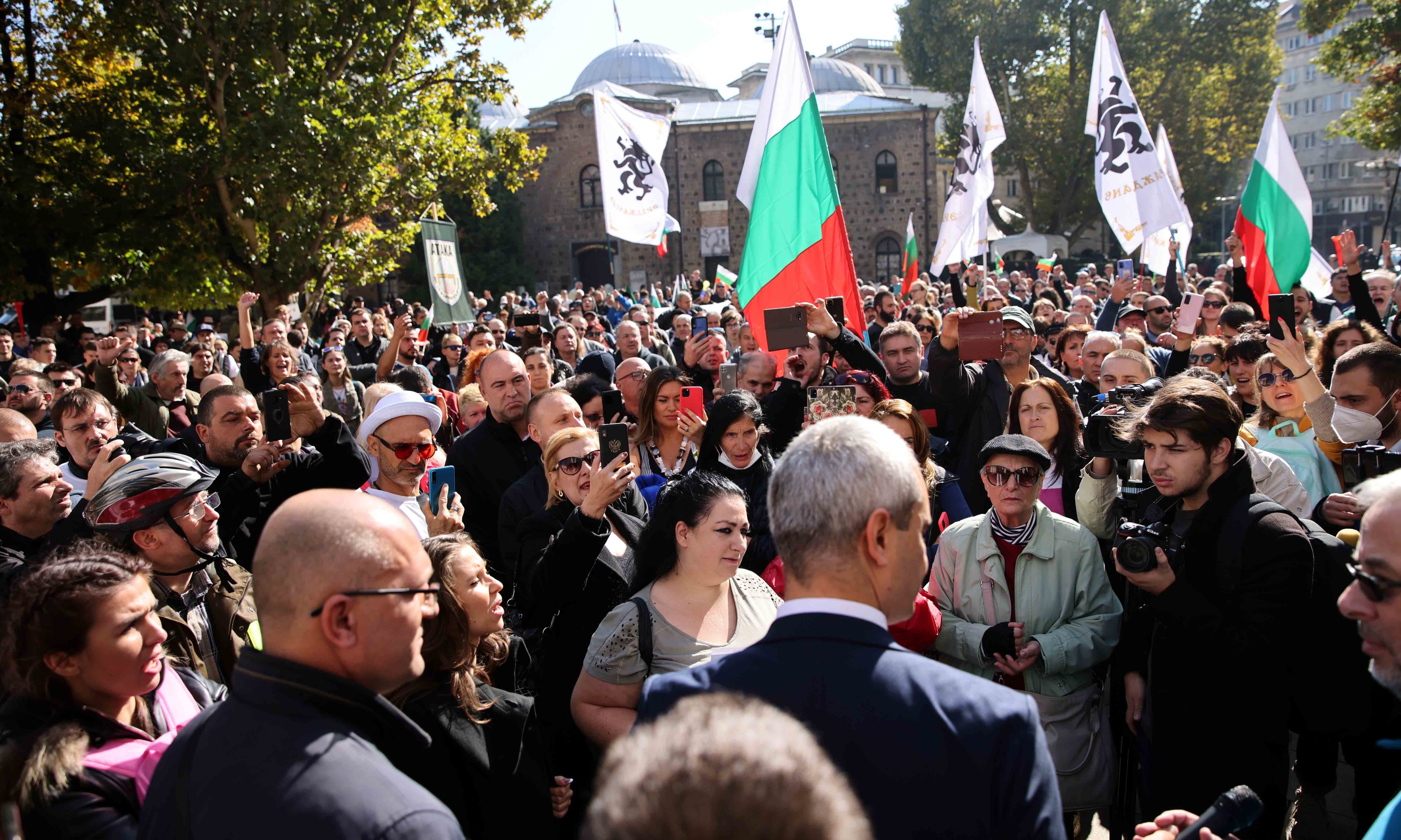 Protesters take part in a demonstration against the mandatory Covid-19 certificate for indoor access, in Sofia, Bulgaria on October 20. — Reuters