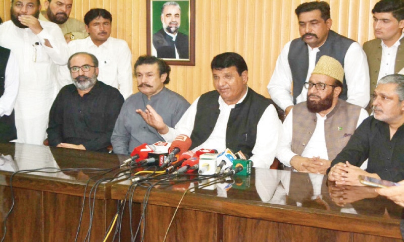 Amir Muqam addresses a presser in Peshawar on Thursday. — White Star