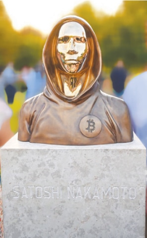 A bronze statue of Satoshi Nakamoto, the mysterious inventor of virtual currency Bitcoin, which was recently unveiled in Hungary | AFP