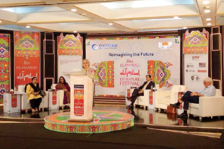 Eminent scholar Najiba Arif speaks at the closing ceremony of the Islamabad Literature Festival on Sunday. Oxford University Press Pakistan Managing Director Arshad Saeed and British journalist Owen Bennett-Jones are also seen on stage. — White Star