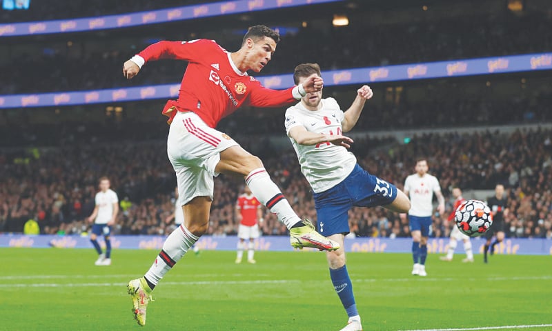 LONDON: Manchester United’s Cristiano Ronaldo scores during the Premier League match against Tottenham Hotspur at the Tottenham Hotspur Stadium.—Reuters LONDON: Manchester United’s Cristiano Ronaldo scores during the Premier League match against Tottenham Hotspur at the Tottenham Hotspur Stadium.—Reuters