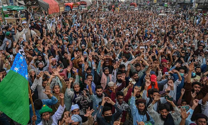 Supporters of the proscribed Tehreek-e-Labbaik Pakistan (TLP) gather in a protest march in Muridke. — AFP/File