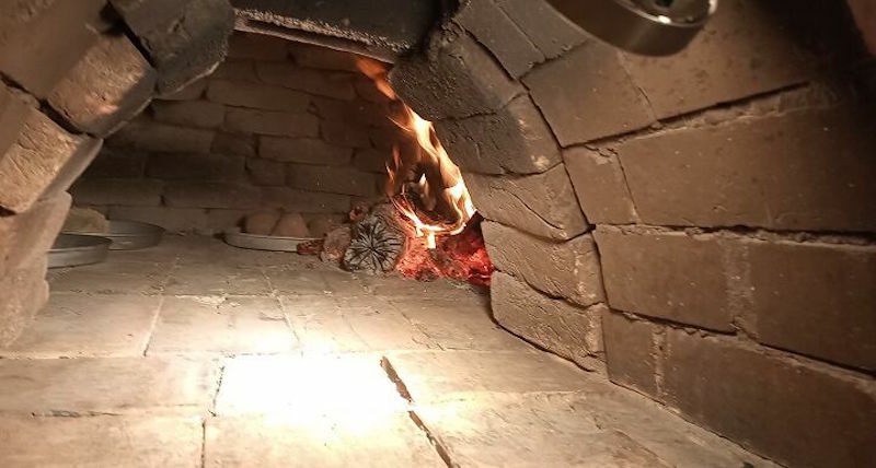 The inside of the brick oven