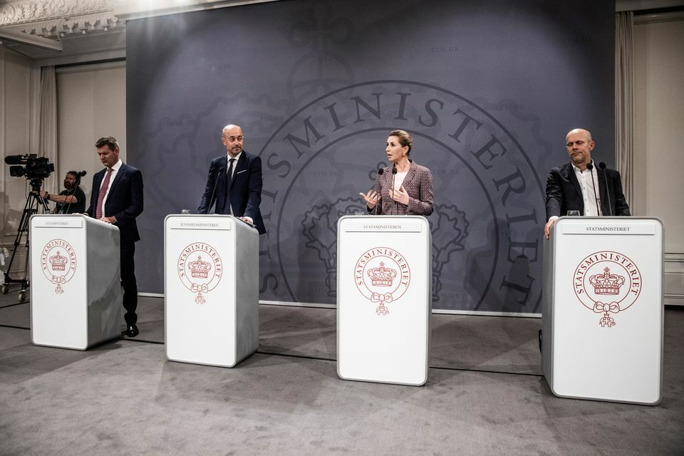 Danish officials speak during a news conference on the coronavirus in the Mirror Hall in the PM's Office at Christiansborg Palace, in Copenhagen, Denmark, Nov 8. — Reuters