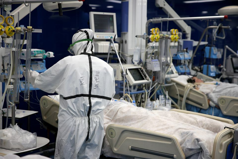 A medic tends to coronavirus patients at the intensive care unit of Pirogov hospital in Sofia, Bulgaria, October 15. — Reuters
