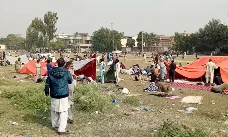 This file photo shows Tehreek-i-Labbaik Pakistan supporters staging a sit-in at a ground in Wazirabad. &mdash; Photo by Iqbal Mirza