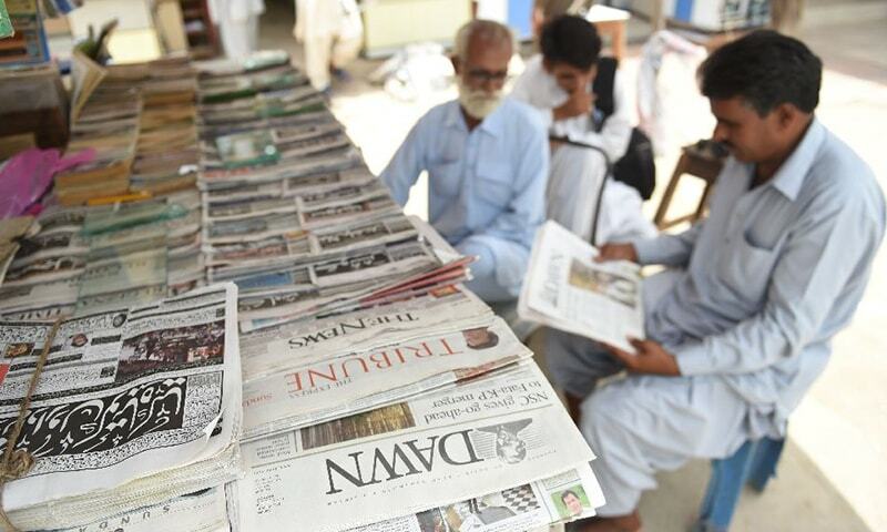 This file photo shows a newspaper stall in Pakistan. — AFP/File