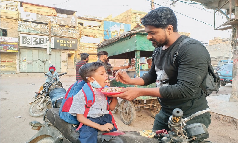 Feeding the little one before dropping him off at school