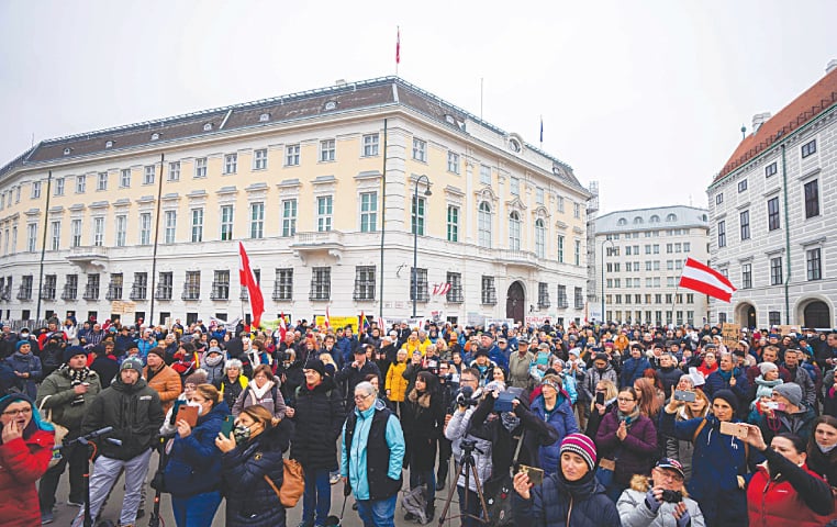 VIENNA: Anti-vaccination demonstrators protest on Sunday.—AFP