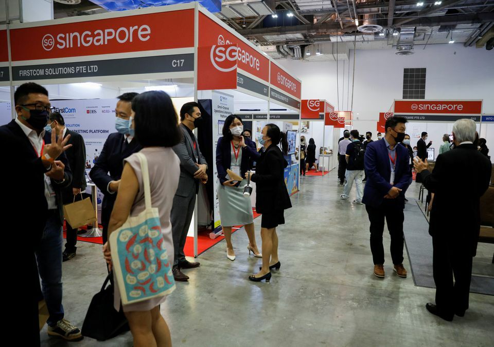 Visitors attend the Restaurants Asia and Cafe Asia trade conventions in Singapore, November 18. &mdash; Reuters