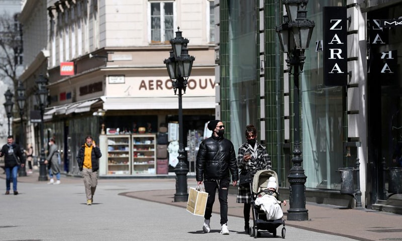 In this file photo, people walk in a shopping street as shops reopen amid the Covid-19 pandemic in downtown Budapest, Hungary. — Reuters/File