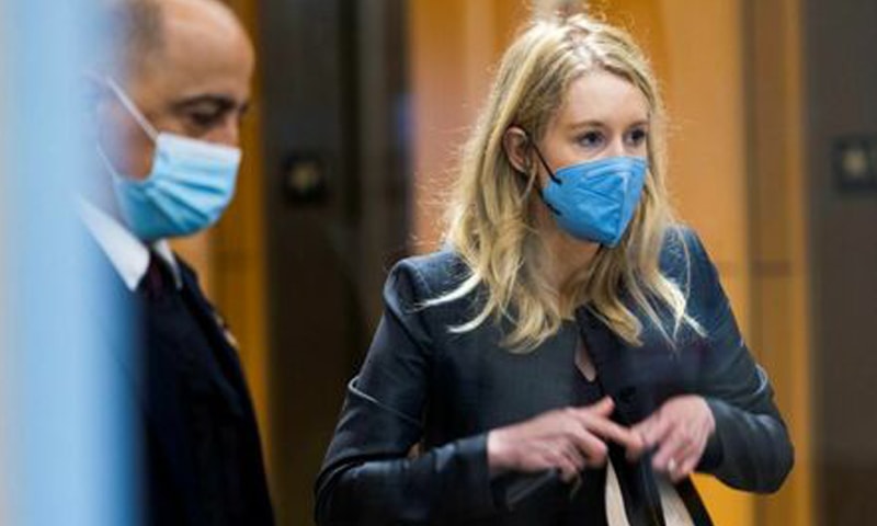 Theranos founder Elizabeth Holmes collects her belongings after arriving to attend her fraud trial at the federal court in San Jose, California, US on November 17. — Reuters/File