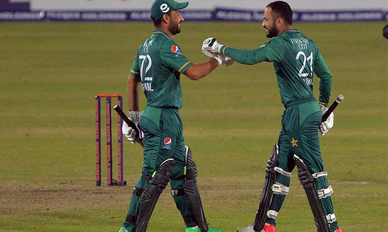 Mohammad Nawaz (R) greets Khushdil Shah after winning the third Twenty20 cricket match between Bangladesh and Pakistan at Sher-E-Bangla National Cricket Stadium in Dhaka. —AFP