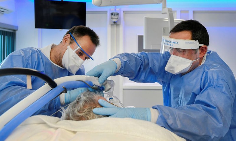 In this file photo, medics treat a patient infected with Covid-19 in the intensive care unit at Maastricht UMC+ Hospital in Maastricht, Netherlands. &mdash; Reuters/File