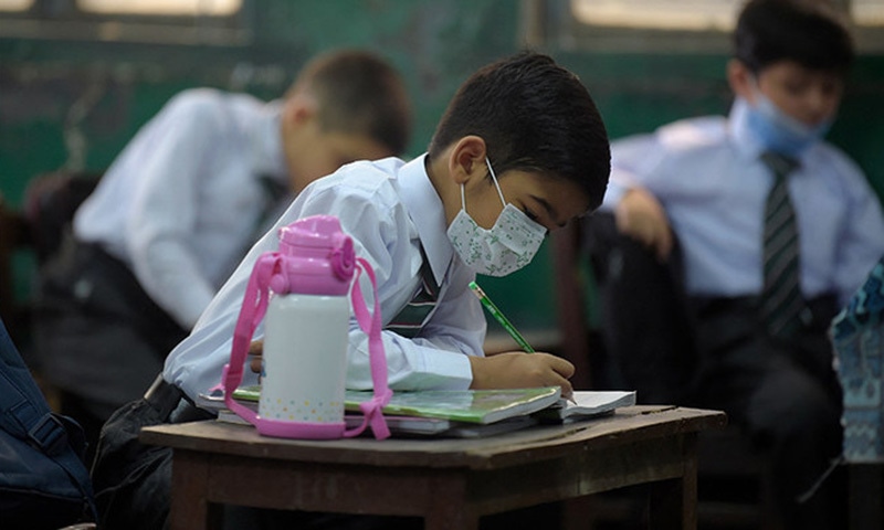 Students attend their class at a school in Rawalpindi. — AFP/File