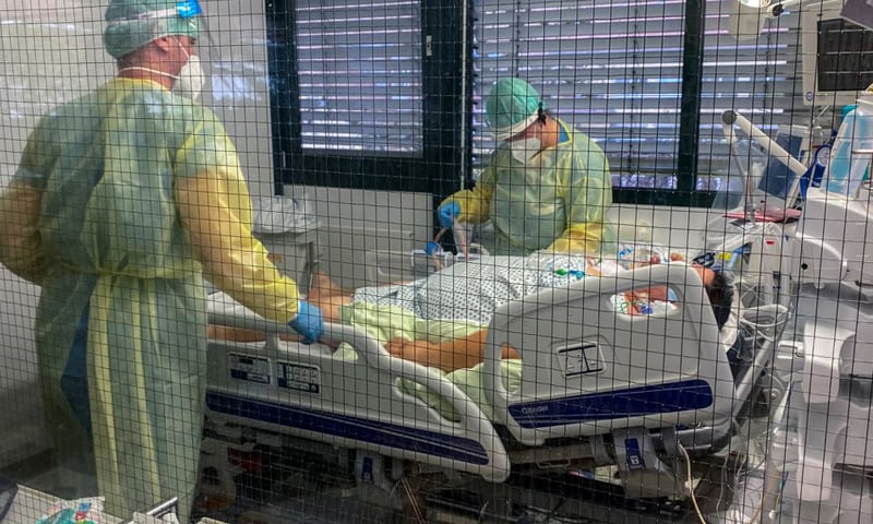 In this file photo, medical staff of Munchen Klinik Schwabing hospital take care of a patient infected with Covid-19 in the intensive care unit in Munich, Germany. &mdash; Reuters/File