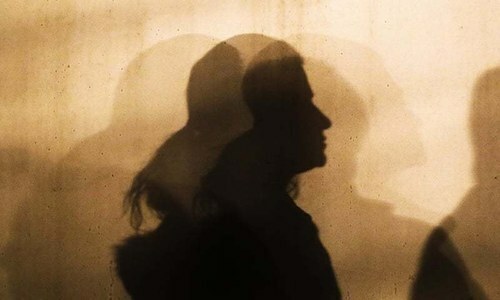 This image shows the silhouette of a woman. — AP/File