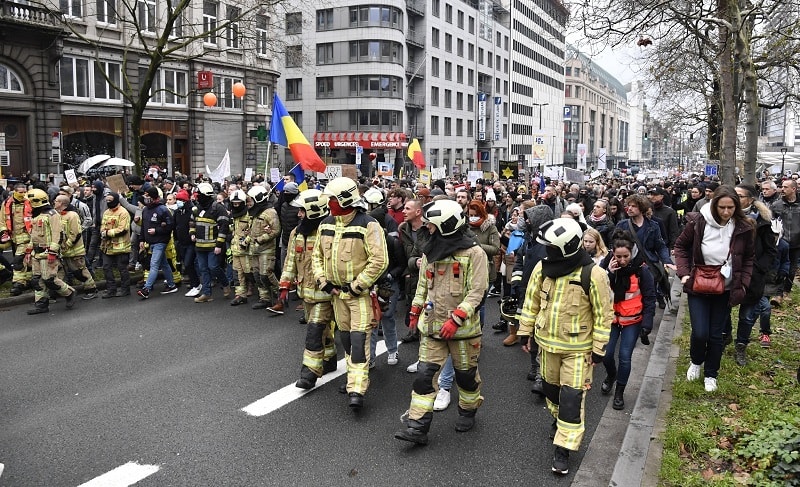 Demonstrators march during a protest against coronavirus measures in Brussels, Belgium, on Sunday. — AP
