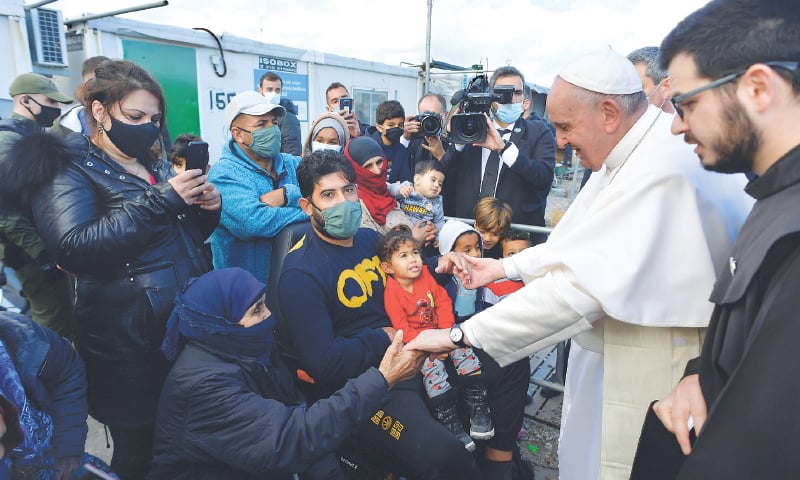 POPE Francis meets refugees at a centre for migrants in Mytilene, on the Greek island of Lesbos.—AFP POPE Francis meets refugees at a centre for migrants in Mytilene, on the Greek island of Lesbos.—AFP