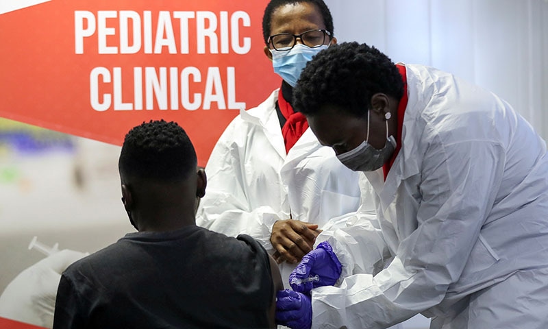 A health worker administers a vaccine during the launch of the South African leg of a global Phase III trial of Sinovac's Covid-19 vaccination of children and adolescents, in Pretoria, South Africa. — Reuters/File